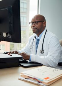 Doctor using computer