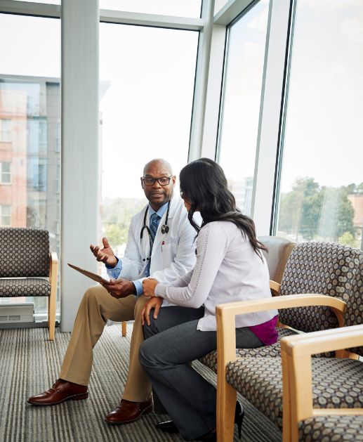 image of healthcare professional talking to a patient